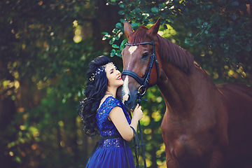 Image showing beautiful girl in dress with horse