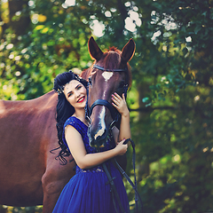 Image showing beautiful girl in dress with horse