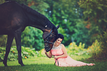 Image showing beautiful girl in dress with horse