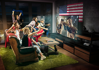 Image showing Group of friends watching TV, sport concept, leisure activity