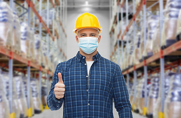 Image showing male worker wearing face mask at warehouse