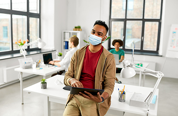 Image showing indian man with tablet pc in face mask at office