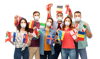 Image showing people in respirators with international flags