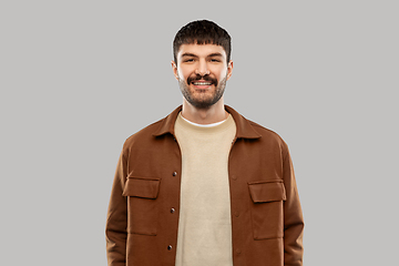 Image showing portrait of happy smiling young man with mustaches