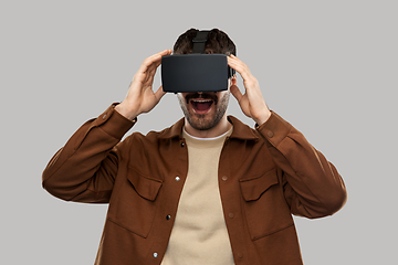 Image showing happy smiling young man in vr glasses