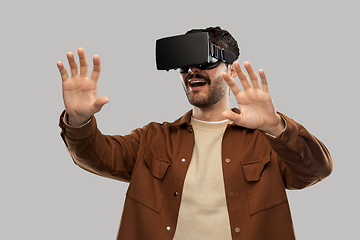 Image showing happy smiling young man in vr glasses