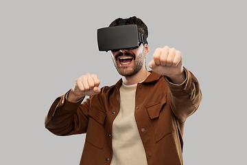 Image showing happy smiling young man in vr glasses