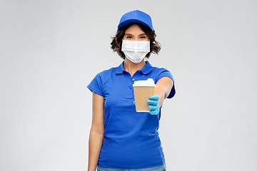 Image showing saleswoman in face mask with takeaway coffee cup