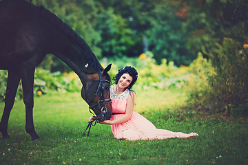 Image showing beautiful girl in dress with horse