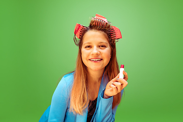 Image showing Teen girl dreaming about future profession of makeup artist