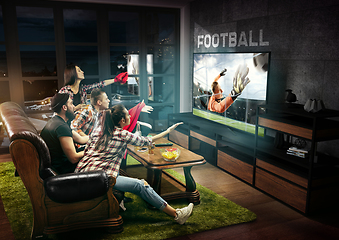 Image showing Group of friends watching TV, sport concept, leisure activity