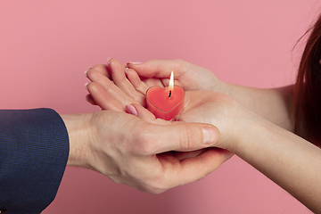 Image showing Valentine\'s day celebration, happy caucasian couple isolated on coral background