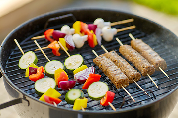 Image showing barbecue meat and vegetables roasting on grill