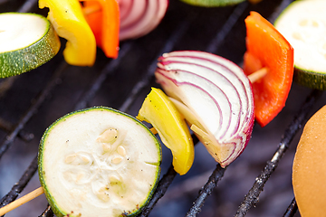 Image showing close up of vegetables roasting on brazier grill