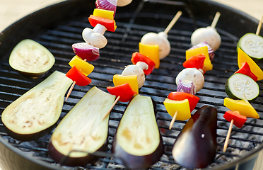 Image showing vegetables and mushrooms roasting on brazier grill