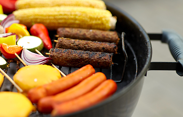 Image showing barbecue kebab meat and vegetables on grill