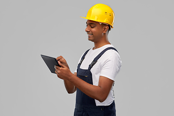 Image showing happy indian builder in helmet with tablet pc