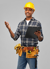 Image showing happy indian builder in helmet with clipboard