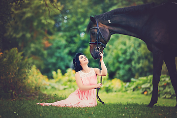 Image showing beautiful girl in dress with horse