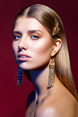 Image showing beautiful girl with long earrings