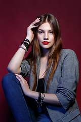 Image showing beautiful girl in jacket with red lips