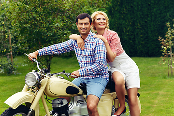 Image showing beautiful couple on retro motorbike