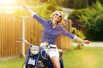 Image showing beautiful girl on retro motorbike