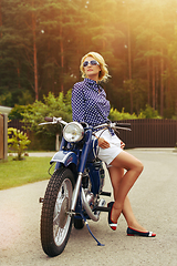 Image showing beautiful girl on retro motorbike