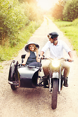 Image showing beautiful couple on retro motorbike