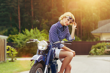 Image showing beautiful girl on retro motorbike