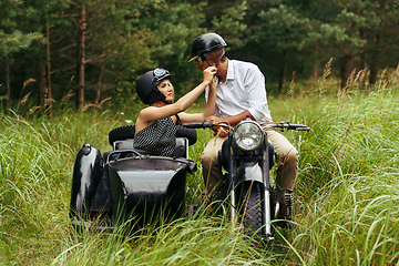 Image showing beautiful couple on retro motorbike