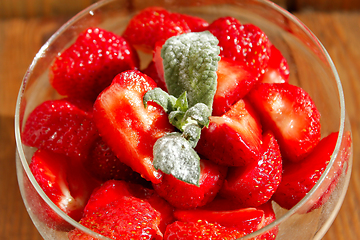 Image showing ripe strawberries in a transparent bowl