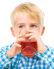 Image showing Little boy with glass of cherry juice