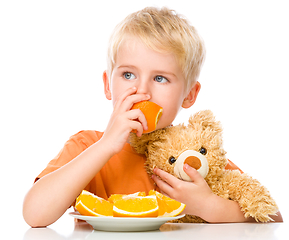 Image showing Portrait of a little boy with his teddy bear