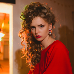 Image showing beautiful blonde woman with red lips and curly hairs