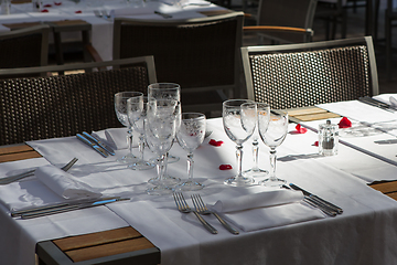 Image showing Close up detail of elegant served table outdoors.