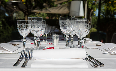 Image showing Close up detail of elegant served table outdoors.