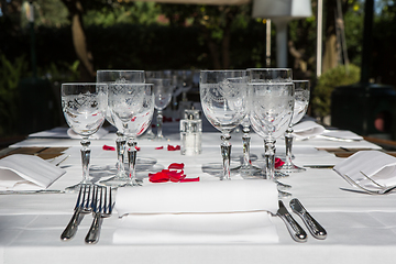 Image showing Close up detail of elegant served table outdoors.