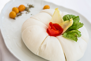 Image showing Mozzarella with tomatos and basil leaves