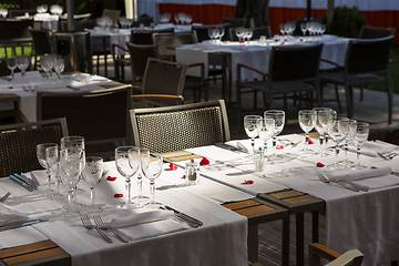 Image showing Close up detail of elegant served table outdoors.