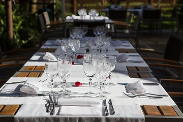 Image showing Close up detail of elegant served table outdoors.