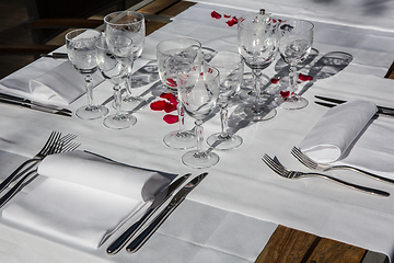 Image showing Close up detail of elegant served table outdoors.