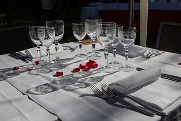 Image showing Close up detail of elegant served table outdoors.