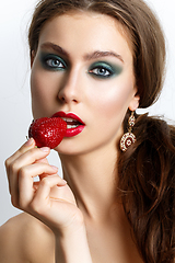 Image showing beautiful girl with fresh strawberries