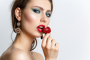 Image showing beautiful girl with fresh strawberries