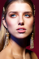 Image showing beautiful girl with long earrings