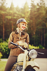 Image showing beautiful girl on retro motorbike