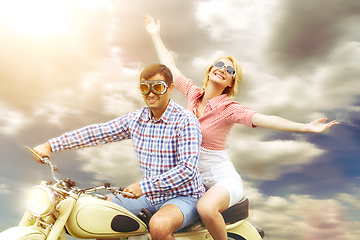 Image showing beautiful couple on retro motorbike