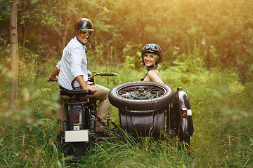 Image showing beautiful couple on retro motorbike