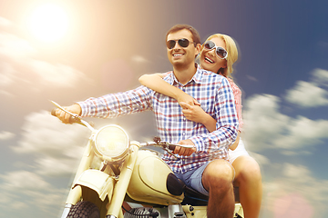 Image showing beautiful couple on retro motorbike